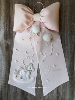 Cavalluccio e palloncini rosa