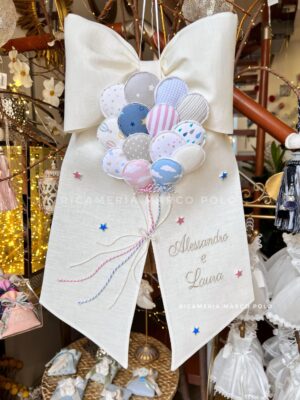 Palloncini azzurri, rosa e tortora per gemelli
