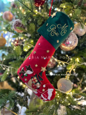 Babbo, slitta e cerbiatto su velluto